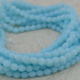 MILKY BLUE 4mm Faceted Round Czech Glass Beads / Light Pastel Blue Firepolished Glass Beads Qty 50 /Opal Blue