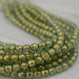 HALO HEAVENS 4mm Faceted Round Czech Glass Beads / Fire Polished Qty 50 Transparent Green Gold Finish Firepolished Czech Beads