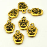 Sugar Skull Charms, 18mm Tierracast Day of the Dead, Rose Skull, Qty 4 Antique Gold Skull Drops, Great to make Day of the Dead Jewelry