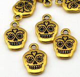 Sugar Skull Charms, 18mm Tierracast Day of the Dead, Rose Skull, Qty 4 Antique Gold Skull Drops, Great to make Day of the Dead Jewelry