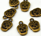 Sugar Skull Charms, 18mm Tierracast Day of the Dead, Rose Skull, Qty 4 Antique Brass Skull Drops, Great to make Day of the Dead Jewelry