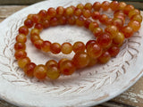 CARNELIAN ORANGE 10 mm Faceted Round Beads / Strand of Dyed Mountain Jade in soft orange / Great Earring Necklace Size