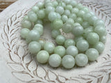 MELON 1Omm Faceted Round Jade Beads /Full Strand Dyed Mountain Jade beads in a light pastel green /Great Earring Necklace Size