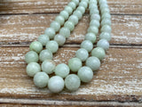 MELON 1Omm Faceted Round Jade Beads /Full Strand Dyed Mountain Jade beads in a light pastel green /Great Earring Necklace Size