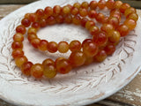 CARNELIAN ORANGE 10 mm Faceted Round Beads / Strand of Dyed Mountain Jade in soft orange / Great Earring Necklace Size