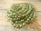 HALO HEAVENS 6mm Faceted Round Czech Glass Beads Qty 25 Fire Polished, Gorgeous Light Green with Metallic Gold Finish